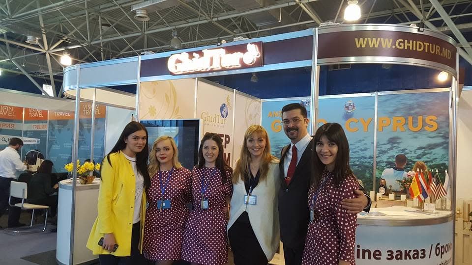 The team at the GhidTur tourism exhibition stand.